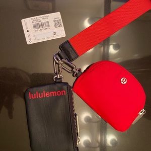 Used only a few times Lululemon dual pouch in red and black.
